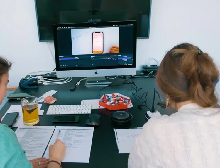 Participant tapping through the McFIT app during testing